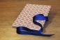 Preview: Mini photo album with graphic diamond pattern, red, white, blue, blue ribbon